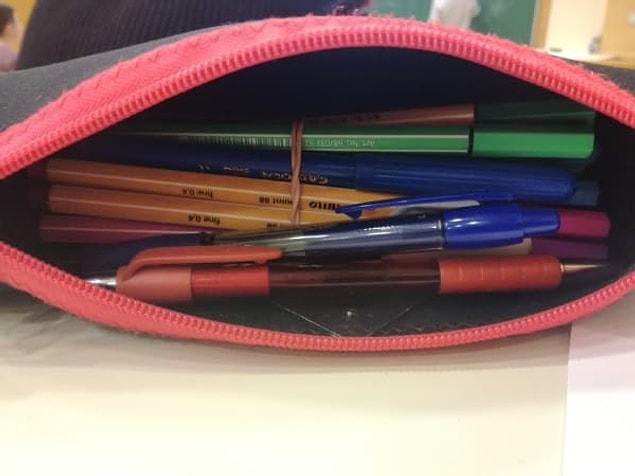 14. Use a rubber band to organise your pencil-box: