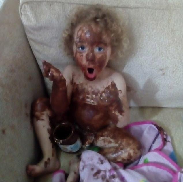 5. She had got her hands on a jar of Nutella and smeared it over herself...