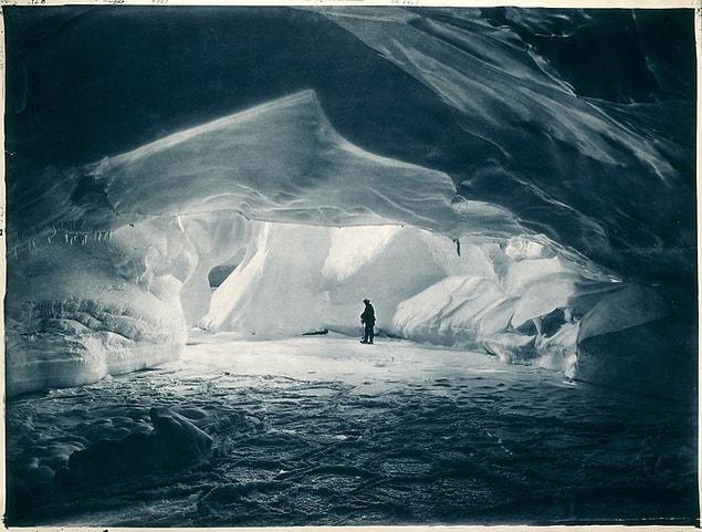 10. Cavern carved by the sea in an ice wall near Commonwealth Bay, 1911–1914