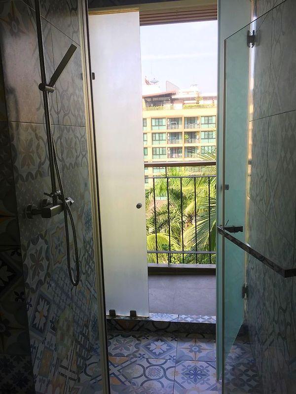 7. "The door to my hotel balcony is in the shower stall."