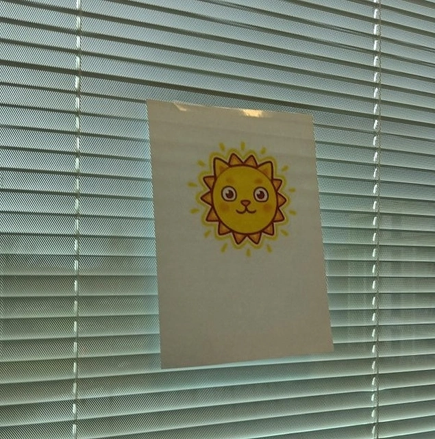 “My colleague noticed that I closed my blinds since the weather was depressing me. When I went to get coffee I came back to this, and it really brightened up my day.”