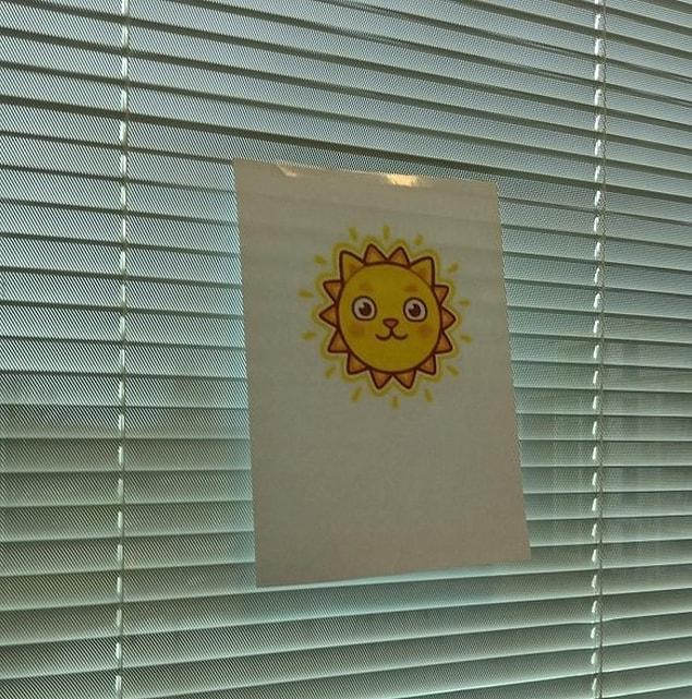 15. “My colleague noticed that I closed my blinds since the weather was depressing me. When I went to get coffee I came back to this, and it really brightened up my day.”