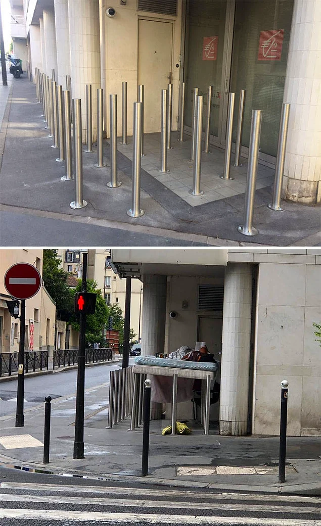Кто-то поставил эти столбы, чтобы бездомные не могли там спать. Но нужда вынуждает быть изобретательным: