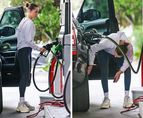 7. Bella Hadid'in benzin istasyonunda arabasının benzinini doldurup lastiklerini kontrol etmesi...
