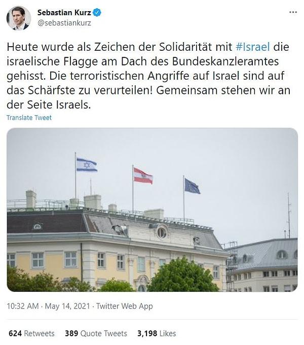 Fotoğrafta Avusturya federal başbakanlık binasının tepesinde Avrupa Birliği, Avusturya başbakanlık ve İsrail bayrakları olduğu görülüyor.