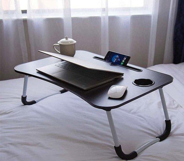 1. Laptop sehpası çalışma masasından sıkılanlar için ideal bir ürün. 👌