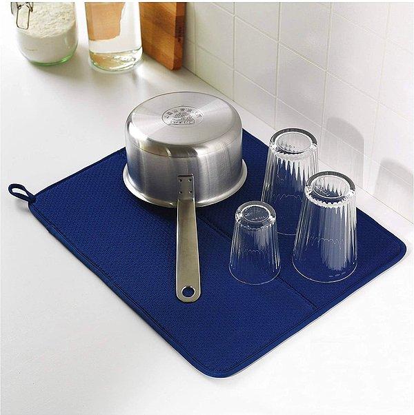 4. Bu bulaşık kurutma örtüsü, bulaşıklarınız için daha fazla kurutma alanı elde etmenin en kolay ve şık yolu.