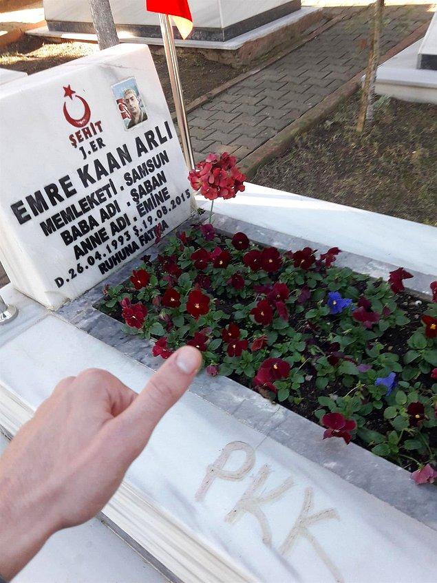 Şahsın, Arlı’nın Körfez Şehitler Mezarlığı'nda bulunan kabristanına 'PKK' yazdı.