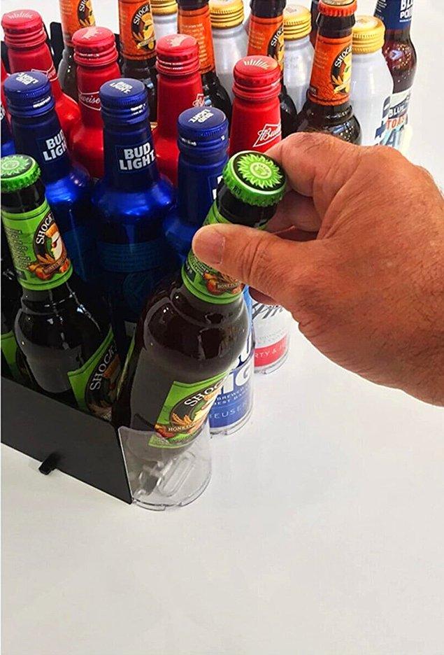 6. Kutu ve şişe içecek tutkunlarının buzdolabında mutlaka olması gereken şey kesinlikle içecek kaydırıcı.