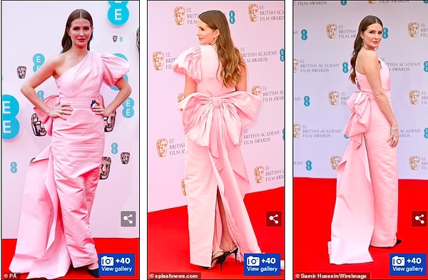 Бледный цвет не очень подходил к оттенку ее кожи, а сочетание одного рукава-фонарика и большого банта сзади выглядело "немного слишком".