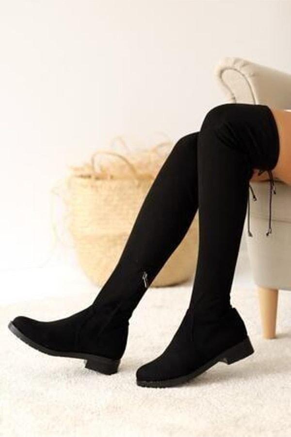 5. Siyah renk uzun streç çizmeler de mini elbiselerin ve mini eteklerin altına çok yakışıyor.