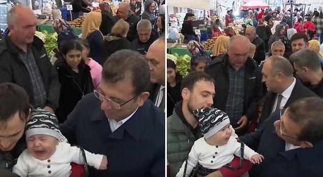 İstanbul Büyükşehir Belediye Başkanı Ekrem İmamoğlu pazar ziyareti sırasında babasının kucağında ağlayan bir bebeği susturdu.