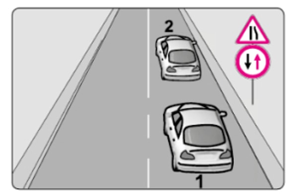 6. Şekildeki trafik işaretlerine göre 1 numaralı araç sürücüsü nasıl davranmalıdır?