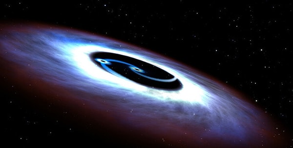 Bilim insanları yaklaşık bir milyar ışıkyılı uzaklıktaki bir galaksiden garip davranışlar gözlemlediler, bu da 2 süper kütleli kara deliğin merkezinde birleştiğini öne sürüyor.