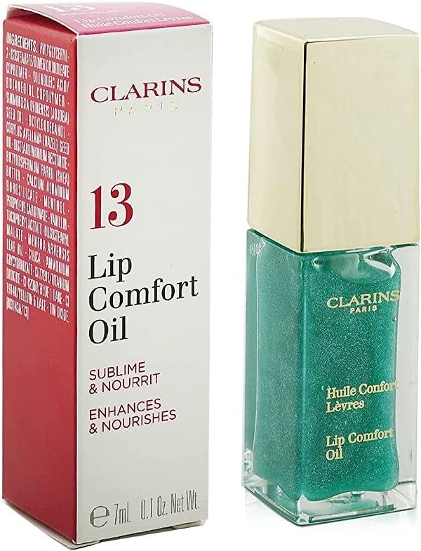 4. Clarins Lip Comfort Oil - Dudak Bakım Yağı