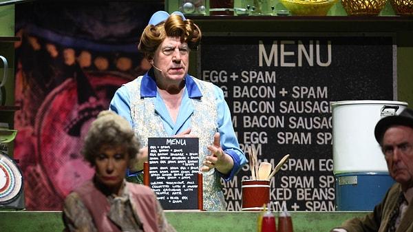 1970 yılında "Spam" adlı bir skeç, Monty Python adlı bir komedi grubu tarafından oynanmıştır. Skeç Spam içeren bütün yemeklerin servis edildiği bir kafede geçmiş ve skecin şarkılarında yer almıştır.
