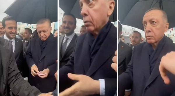 Cumhurbaşkanı Erdoğan çocuklara para dağıttığı sırada bir vatandaş dağıttığı paradan almak istedi.