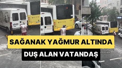 İstanbul'da Bir Vatandaş Arabasından İnerek Sağanak Yağış Altında Duş Aldı
