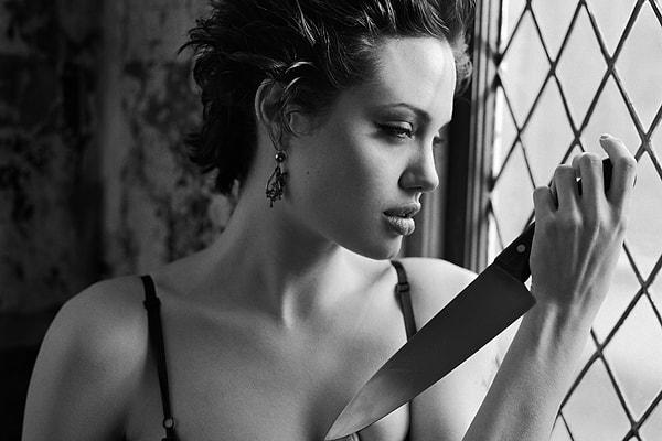 3. Angelina Jolie - Knife Thrower