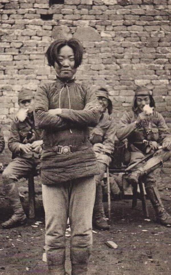 15. Çinli gerilla savaşçısı Cheng Ben Hua son anlarında gülümsüyor.