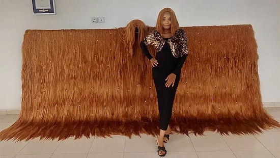Nigerian Wig Maker Sets Guinness World Record for The Widest Wig Ever