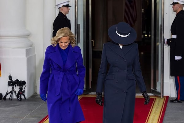 Before the ceremony, Melania posed for photos with former President Joe Biden and Jill Biden, but her expression behind the hat remained hidden.