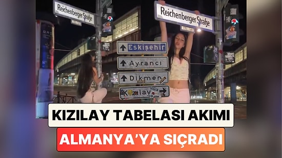 Kızılay Tabelasına Asılma Akımı Almanya'ya Sıçradı: Kreuzberg'de Bir Kadın Tabelaya Asılarak Fotoğraf Çekildi