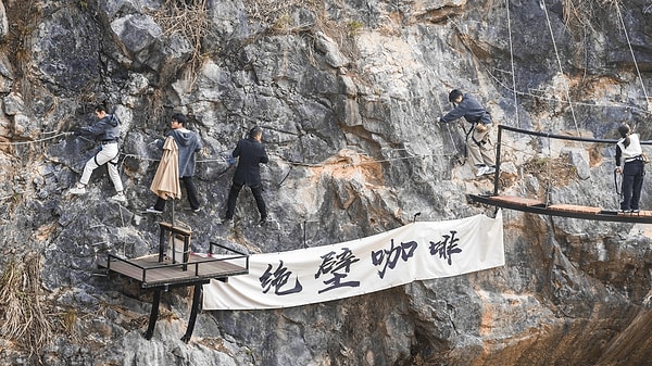 You're first scaling a rock face before indulging in a cup of coffee.