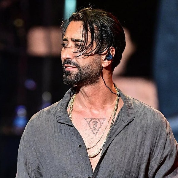 For years, Tan Taşçı has been making waves with his music, stage performances, and record-breaking concert marathons. However, this time around, he caught the public's attention on Thursday, May 21st, when he was thrust into the spotlight due to an arrest warrant issued in connection with an investigation into illicit substances.