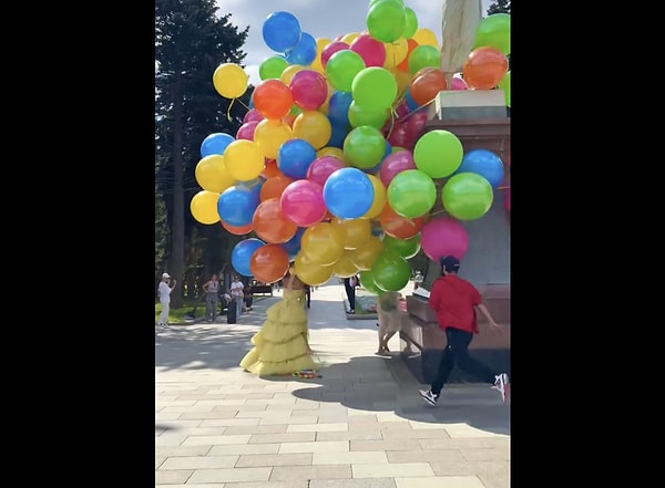 Can helium-filled balloons truly enable a person to fly?