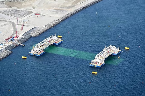 Production continues unabated at the factory, with parts being transported to the sea via a special ship.